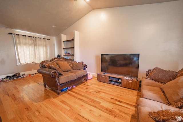 1137 S Topaz Rd, Saratoga Springs, UT 84045 - living room featuring wood finished floors, lofted ceiling, and baseboards