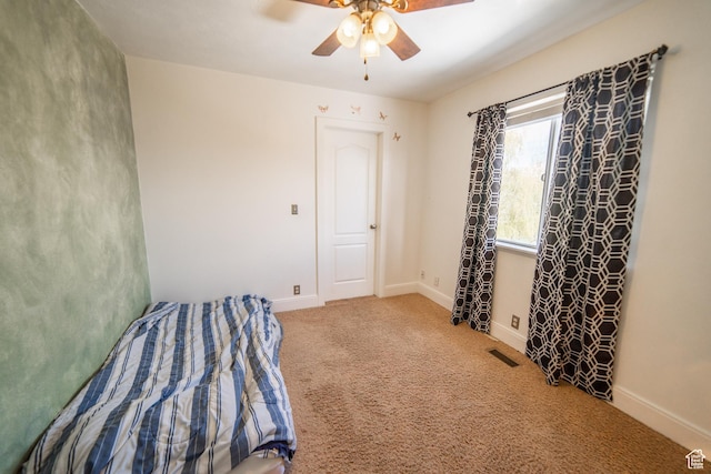 1137 S Topaz Rd, Saratoga Springs, UT 84045 - unfurnished bedroom featuring carpet flooring, ceiling fan, and baseboards