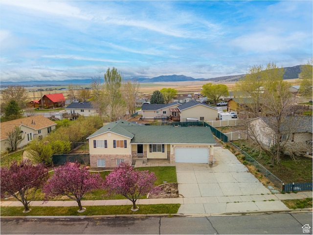 aerial view with a mountain view and a residential view