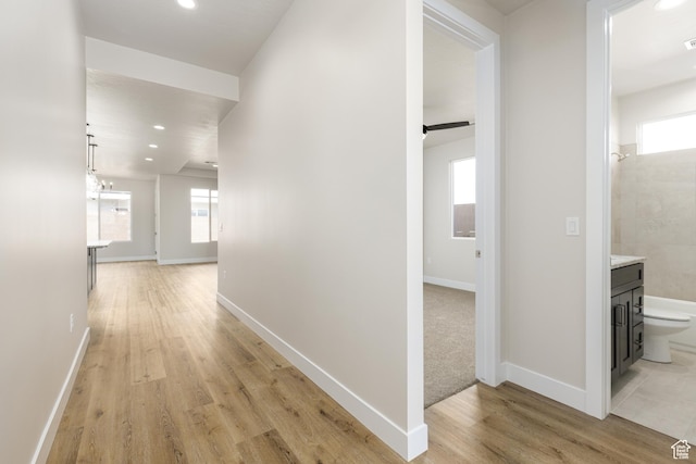 2187 W 320 S, Hurricane, UT 84737 - hall with light wood-type flooring, plenty of natural light, baseboards, and recessed lighting