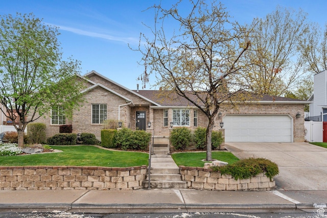 ranch-style home with concrete driveway, brick siding, a front yard, and a garage