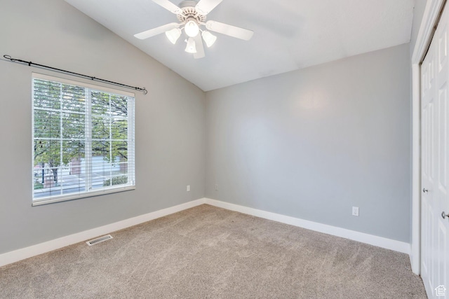 253 Ridge Rd, Orem, UT 84057 - unfurnished room with light carpet, vaulted ceiling, baseboards, visible vents, and a ceiling fan