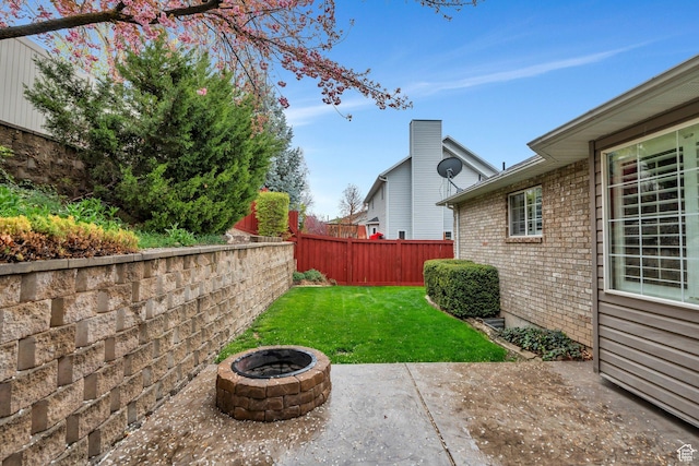 253 Ridge Rd, Orem, UT 84057 - view of yard with a fire pit, a patio area, and a fenced backyard
