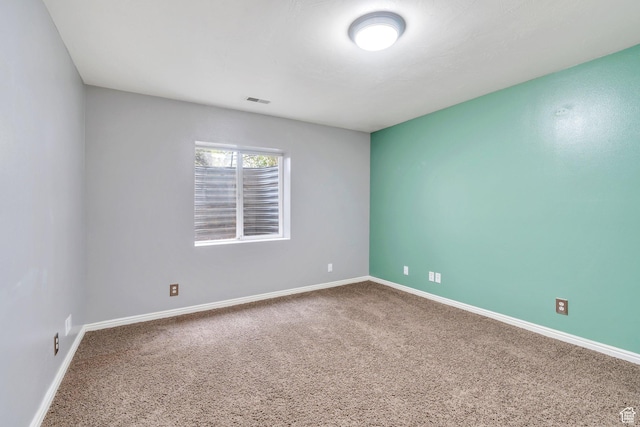 253 Ridge Rd, Orem, UT 84057 - spare room with carpet floors, visible vents, and baseboards