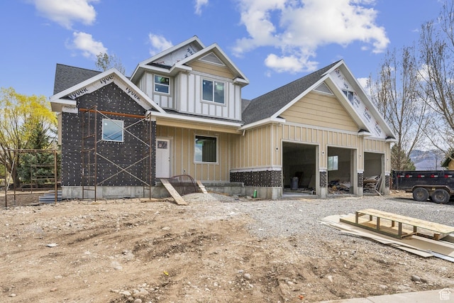 1121 Fieldstone Ct, Heber City, UT 84032 - view of front of house featuring covered porch, board and batten siding, and a garage