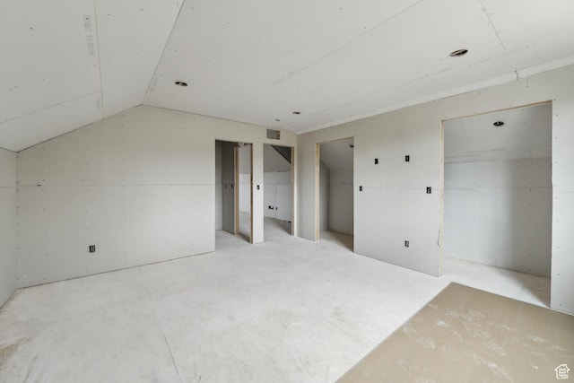 1121 Fieldstone Ct, Heber City, UT 84032 - unfurnished bedroom with two closets, lofted ceiling, and visible vents