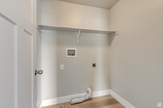 462 S 1430 E Unit 114, Tooele, UT 84074 - laundry room with hookup for an electric dryer, baseboards, washer hookup, wood finished floors, and laundry area