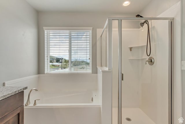 462 S 1430 E Unit 114, Tooele, UT 84074 - bathroom with a shower stall, vanity, and plenty of natural light