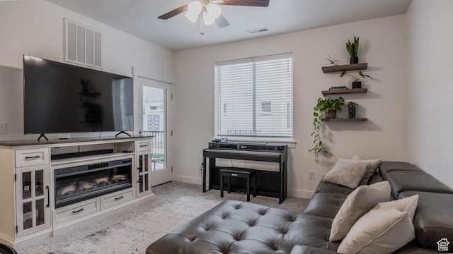 1984 N 3410 W Unit R102, Lehi, UT 84043 - carpeted living room featuring ceiling fan, baseboards, and visible vents