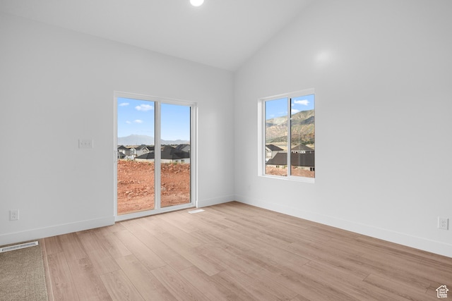1975 S Marigold Way Unit 433, Santaquin, UT 84655 - empty room with light wood-style flooring and high vaulted ceiling