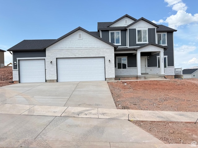 1975 S Marigold Way Unit 433, Santaquin, UT 84655 - view of front of house with a garage, driveway, and a porch