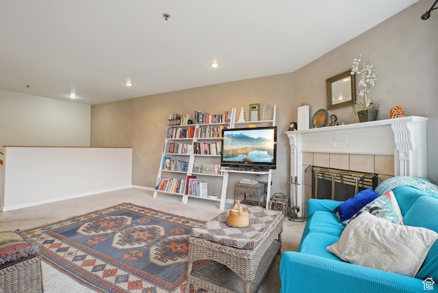 carpeted living room with recessed lighting and baseboards