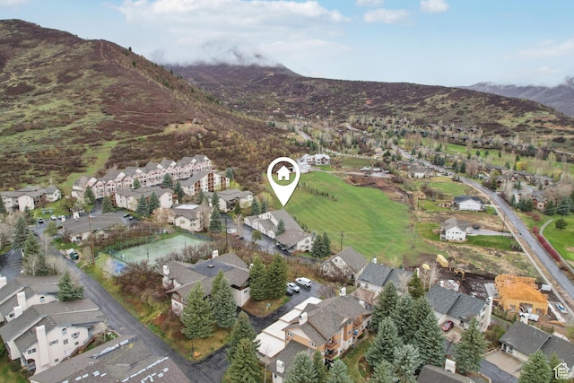 aerial view featuring a mountain view and a residential view