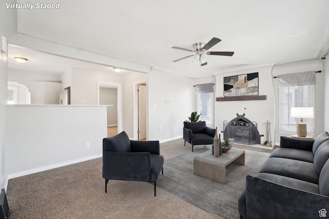 2662 Jackson Ave, Ogden, UT 84401 - living area with baseboards, a ceiling fan, and carpet