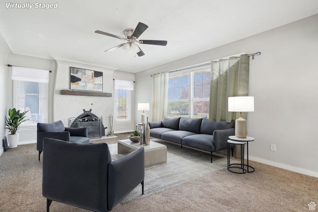 2662 Jackson Ave, Ogden, UT 84401 - carpeted living area with a ceiling fan and baseboards