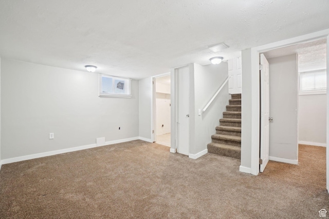 2662 Jackson Ave, Ogden, UT 84401 - basement featuring carpet, baseboards, and stairway