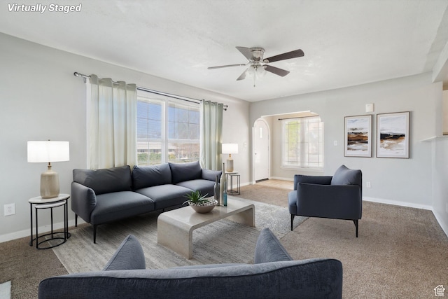 2662 Jackson Ave, Ogden, UT 84401 - living room featuring carpet floors, a ceiling fan, and a wealth of natural light