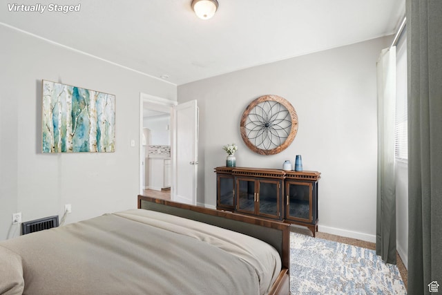 2662 Jackson Ave, Ogden, UT 84401 - bedroom featuring baseboards, visible vents, and carpet