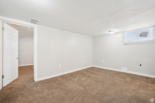 2662 Jackson Ave, Ogden, UT 84401 - below grade area featuring carpet floors, visible vents, and baseboards