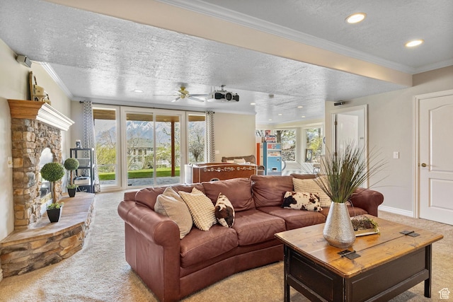 carpeted living room featuring recessed lighting, a textured ceiling, a ceiling fan, and ornamental molding
