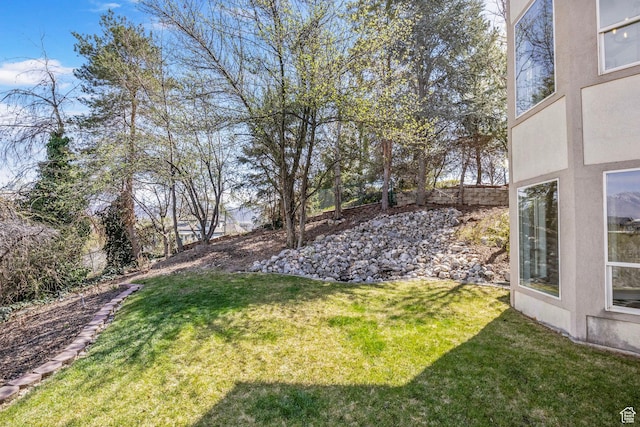 view of yard featuring fence