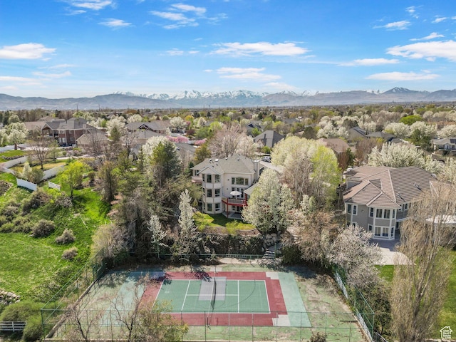drone / aerial view featuring a mountain view and a residential view