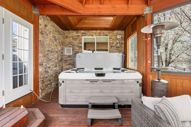 interior space with a hot tub