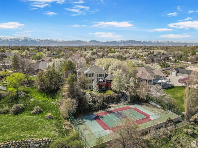 aerial view featuring a mountain view and a residential view