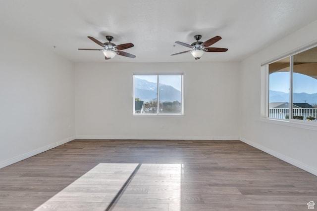 502 S 1040 E Unit 235C, American Fork, UT 84003 - spare room with baseboards, a ceiling fan, and wood finished floors