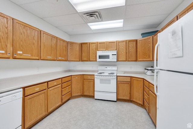 502 S 1040 E Unit 235C, American Fork, UT 84003 - kitchen with visible vents, a drop ceiling, white appliances, and light countertops