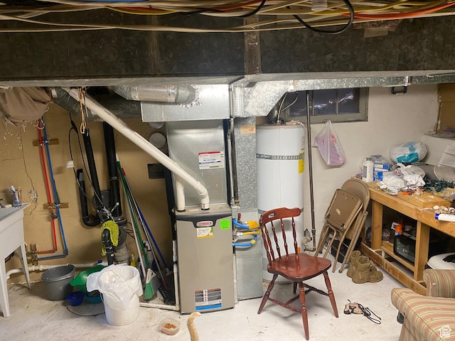 utility room with water heater