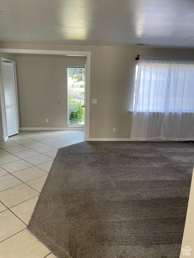 1525 E 5700 S, Murray, UT 84121 - spare room featuring light tile patterned flooring, visible vents, and baseboards
