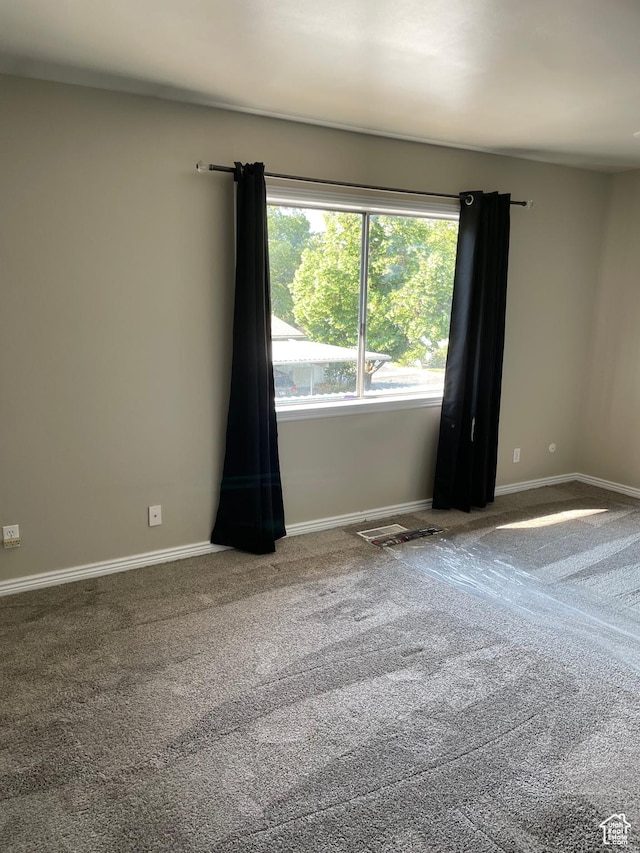 1525 E 5700 S, Murray, UT 84121 - carpeted spare room featuring baseboards
