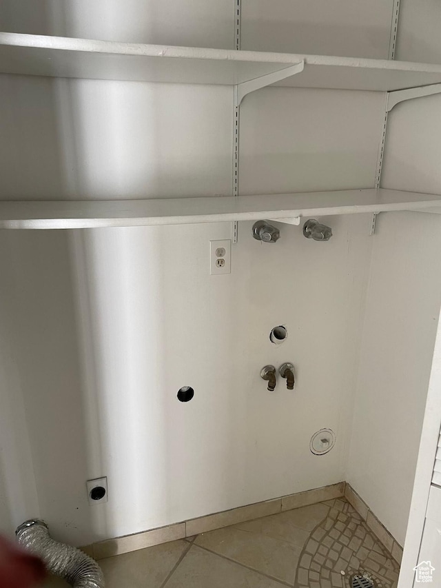 1525 E 5700 S, Murray, UT 84121 - washroom with baseboards, washer hookup, electric dryer hookup, laundry area, and light tile patterned floors