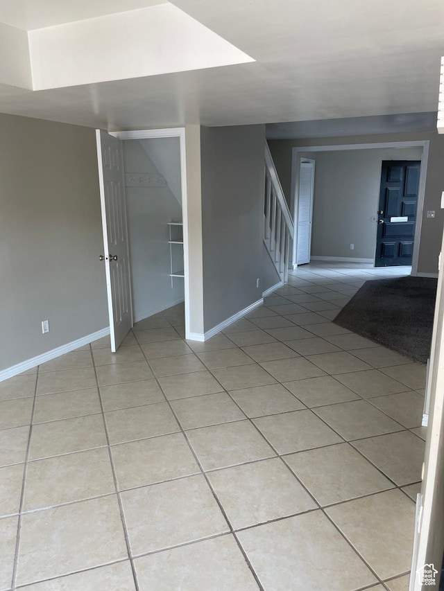 1525 E 5700 S, Murray, UT 84121 - empty room featuring stairway, baseboards, and light tile patterned floors