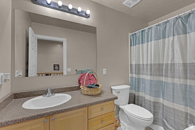 2838 N 1375 E, North Ogden, UT 84414 - full bath featuring a shower with curtain, a textured ceiling, toilet, visible vents, and vanity