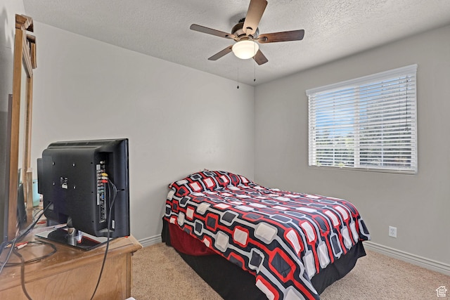2838 N 1375 E, North Ogden, UT 84414 - bedroom featuring carpet floors, a textured ceiling, a ceiling fan, and baseboards