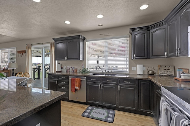 2838 N 1375 E, North Ogden, UT 84414 - kitchen featuring a wealth of natural light, a sink, a textured ceiling, and appliances with stainless steel finishes