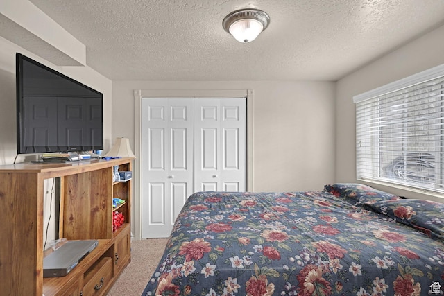 2838 N 1375 E, North Ogden, UT 84414 - carpeted bedroom with a textured ceiling and a closet