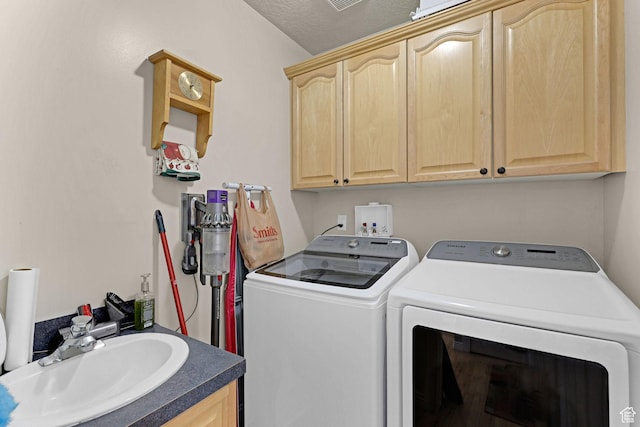 2838 N 1375 E, North Ogden, UT 84414 - washroom with washer and dryer, cabinet space, a sink, and visible vents