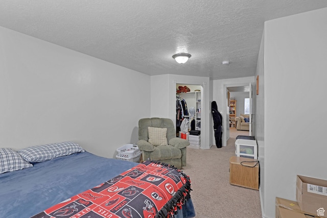 2838 N 1375 E, North Ogden, UT 84414 - carpeted bedroom featuring a textured ceiling and a closet