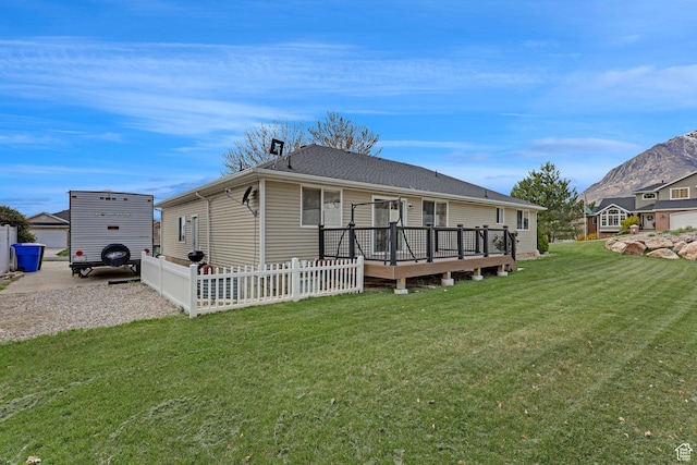 2838 N 1375 E, North Ogden, UT 84414 - rear view of property with a wooden deck, fence, and a yard