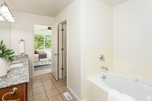 917 W Willow Bend Way, Farmington, UT 84025 - ensuite bathroom featuring a bath, tile patterned floors, ensuite bathroom, visible vents, and vanity