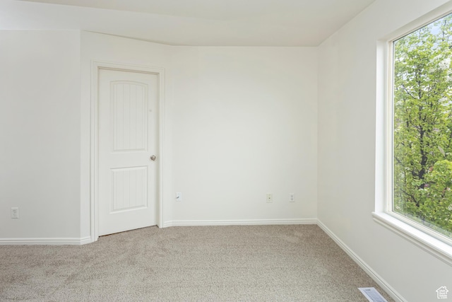 917 W Willow Bend Way, Farmington, UT 84025 - empty room featuring carpet floors, visible vents, baseboards, and plenty of natural light