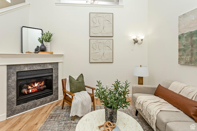 917 W Willow Bend Way, Farmington, UT 84025 - living area featuring baseboards, wood finished floors, and a fireplace