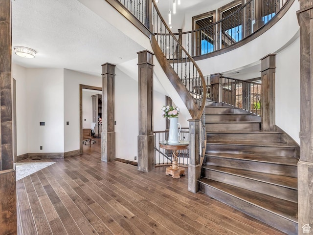 15146 S Secret Canyon Cir, Herriman, UT 84096 - stairs with baseboards and wood finished floors