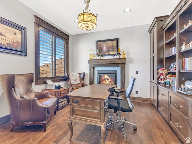 15146 S Secret Canyon Cir, Herriman, UT 84096 - office space featuring baseboards, recessed lighting, dark wood-style flooring, and a fireplace