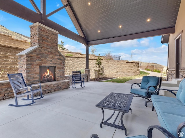 15146 S Secret Canyon Cir, Herriman, UT 84096 - view of patio featuring an outdoor living space with a fireplace and fence