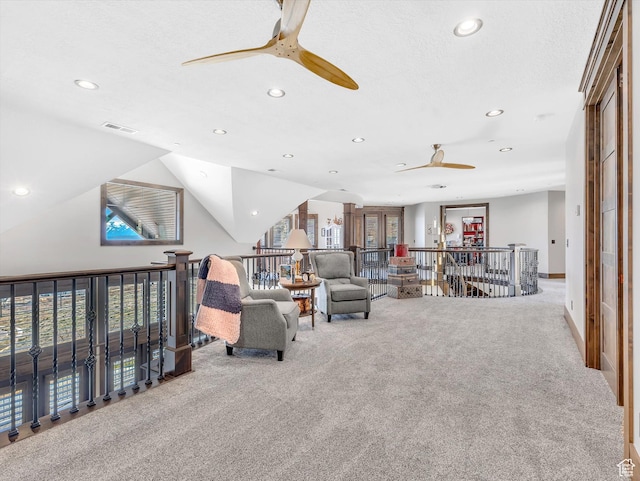 15146 S Secret Canyon Cir, Herriman, UT 84096 - carpeted living room with ceiling fan, lofted ceiling, visible vents, and recessed lighting