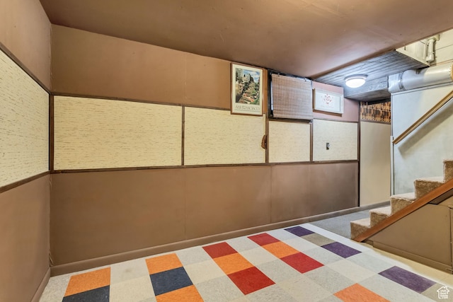 2481 Van Buren Ave, Ogden, UT 84401 - finished below grade area with tile patterned floors and stairway